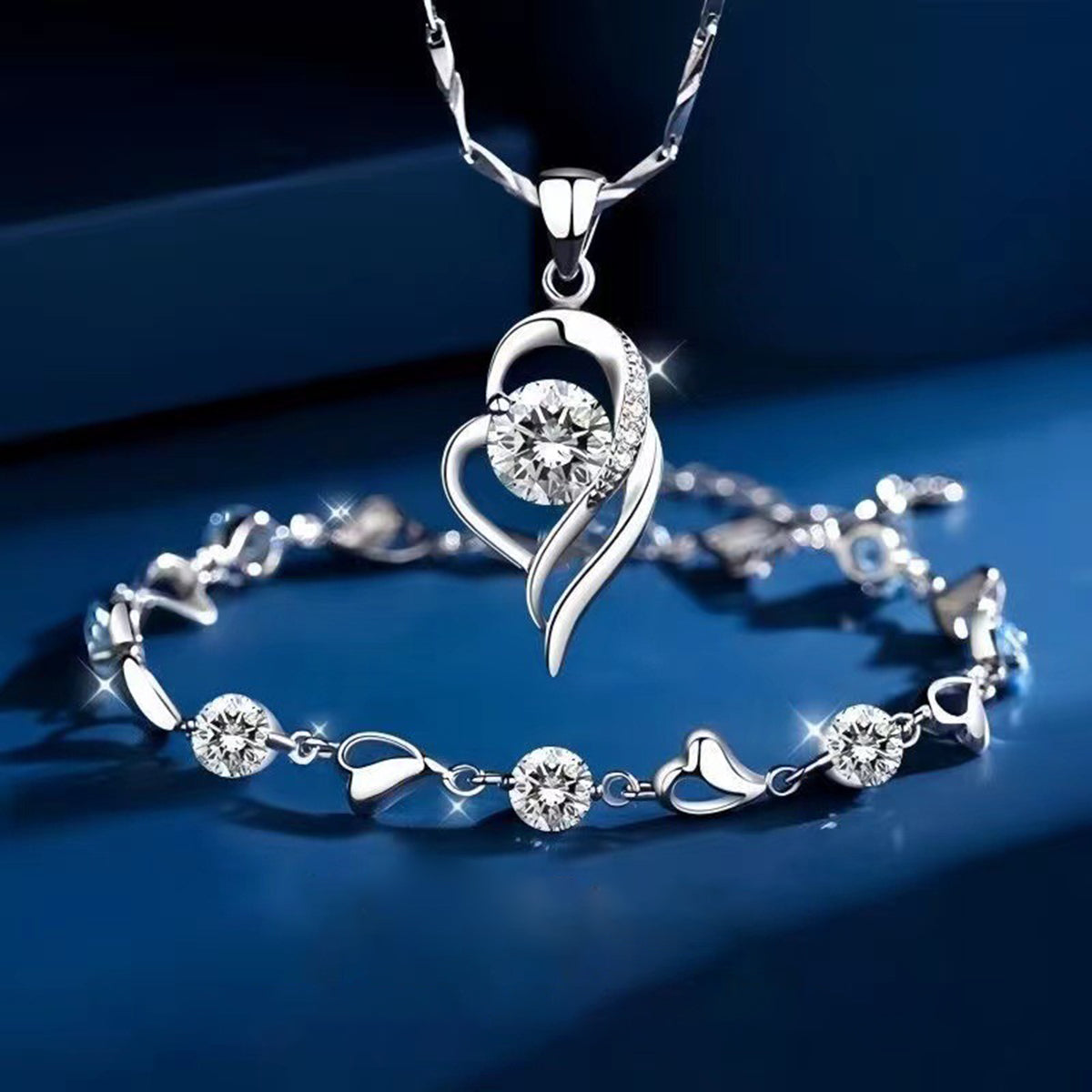 ✨✨【Kupite 1, dobite 1 gratis】💎Komplet zapestnice in ogrlice Srce oceana, srebro 925
