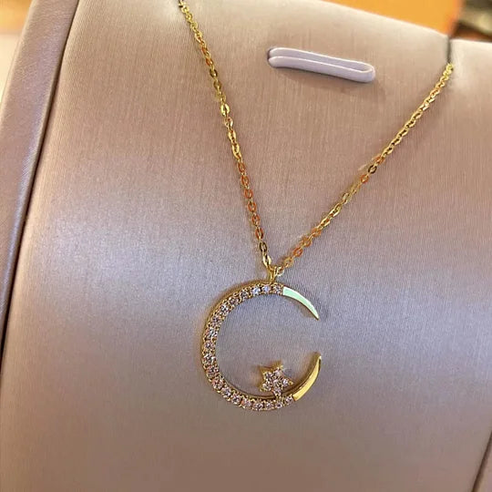 🔥【Kup jeden, a drugi dostaniesz gratis】💖💎 Naszyjnik z wisiorkiem gwiazda i księżyc, nowa kolorystyka, inkrustowany diamentami